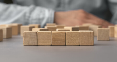A pile of empty wood block on table. Top view. Business concept for growth success process. Copy space.
