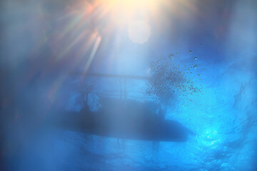 sun rays scuba reef / blue sea, abstract background, sunny day, rays in water