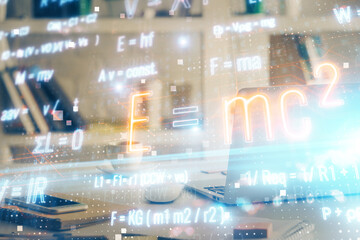 Desktop computer background and formula hologram writing. Double exposure. Education concept.