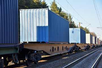 Cargo containers transportation on freight train by railway. Coronavirus Wreaks Havoc On Global...