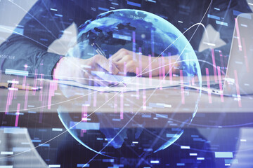 Double exposure hands with stock market chart.