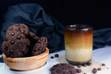 Chocolate granules cookies served with strong Vietnamese drip coffee, bitter coffee and sweet cookies are best served when relaxing such as reading a book or when we need energy