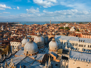 Fototapeta na wymiar View of Venice with famous St Mark's Basilica and Doge's Palace on sunset from St Mark's Campanile bell tower, Venice, Italy