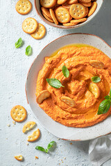Homemade tomato hummus as healthy and quick snack