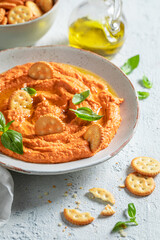 Delicious tomato hummus as healthy and quick snack