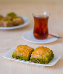 Turkish sweet baklava on plate.