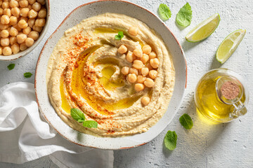 Enjoy your hummus with mint leaves and lime