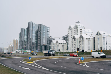Road on the waterfront in Reykjavik, the capital of Iceland. Residential complexes on the edge of...