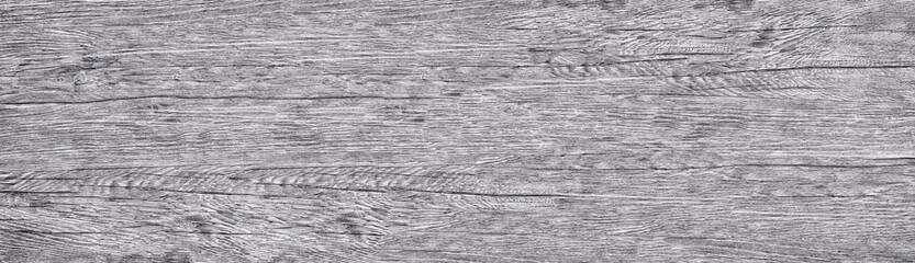 Light gray shabby wooden grain texture. Wide wood surface background