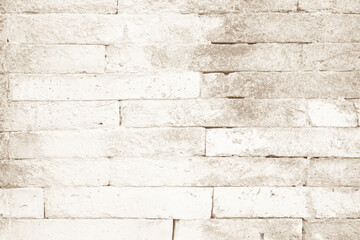 Empty Background of wide cream brick wall texture. Old brown brick wall concrete or stone pattern nature, wallpaper limestone abstract floor/Grid uneven interior rock. Home & office design backdrop.