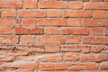 Texture background. The old red brick wall.