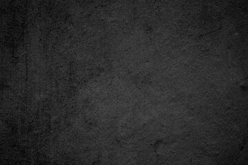 Art black concrete stone texture for background in black. 