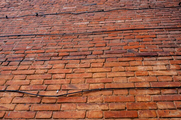 Texture background. The old red brick wall.