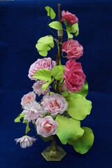  a bouquet of flowers made of bright paper