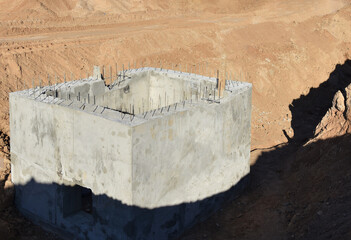 Construction of stormwater pits, sanitary sewer system distribution chamber and pump station. Sewerage manhole and pipes line under construction at the construction site. Sewage treatment works