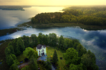Panorama of the Studzieniczne Lake with the Chapel of the Virgin Mary in Studzieniczna. Augustow, Poland.