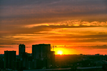 Fototapeta na wymiar beautiful sunset over the silhouette of the east of Moscow color