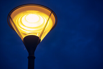 Street lantern against the black sky low light