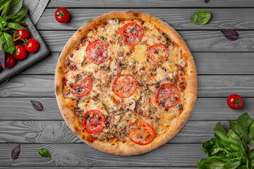 Tasty hot italian pizza with mushrooms, tomatoes and cheese. Pizzeria menu. Concept poster for Restaurants or pizzerias. Top view