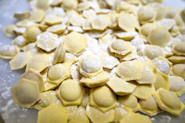 Russian traditional pelmeni with meat. Uncooked freshly made raw