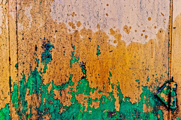 Texture old emerald - tangerine paint on metal