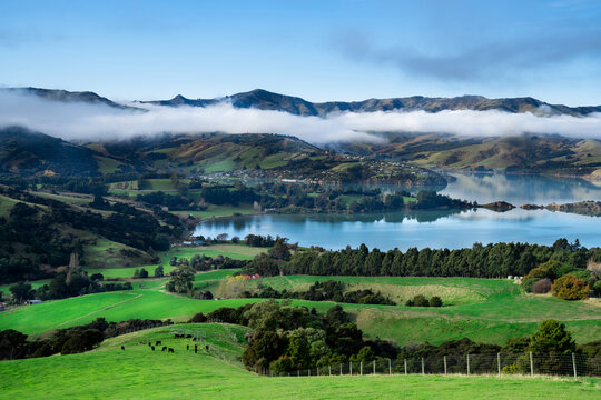 Silhouette of mountains in the misty morning. View of the mountains in early winter. Beautiful nature landscape. Bank Peninsula, Robinsons bay, Canterbury, Ndw Zealand.