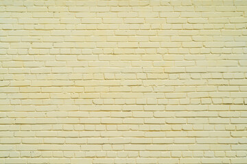 Yellow brick wall. Exterior of an old building. Antique interior structure.