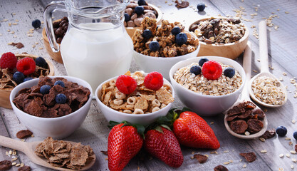 Bowls with different sorts of breakfast cereal products