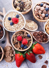 Bowls with different sorts of breakfast cereal products