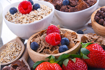 Bowls with different sorts of breakfast cereal products