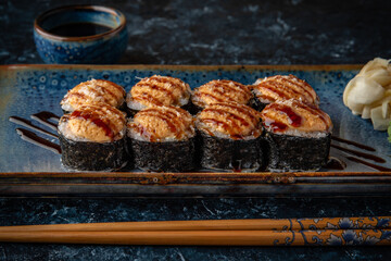 Hot fried rolls. Sushi with fresh ingredients. Sushi menu. Japanese food. 