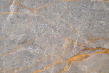 background texture of gray marble tiles with orange stripes.