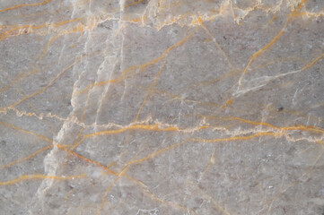 background texture of gray marble tiles with orange stripes.