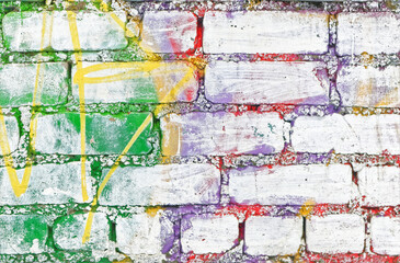 Texture bricks wall stained with multi-colored paint