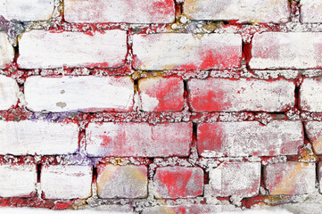 Texture bricks wall stained with multi-colored paint