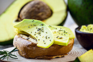 avocado with toasted bread, vegetarian and healthy meal.