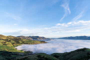 Silhouette of mountains in the misty morning. View of the mountains in early winter. Beautiful...