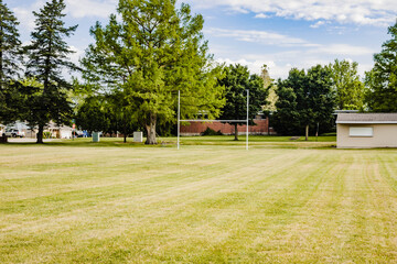 view from the midfield of a youth football field in a city park