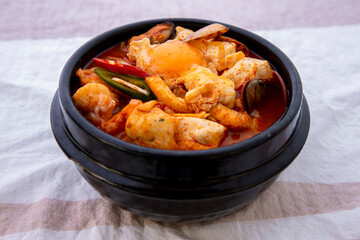 Korean spicy silken tofu stew with seafood