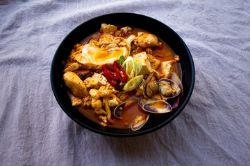 Korean spicy silken tofu stew with seafood