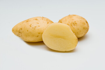 Fresh potatoes on white background