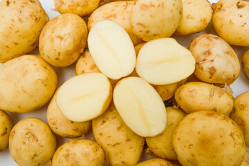 Fresh potatoes on white background