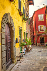 Street with historic houses in Montecatini Alto - medieval village above Montecatini Terme town in Tuscany, Italy, Europe.
