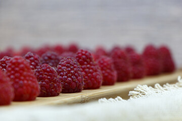 Ripe red raspberries, selective focus.