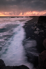 Black beach during sunset - Iceland
