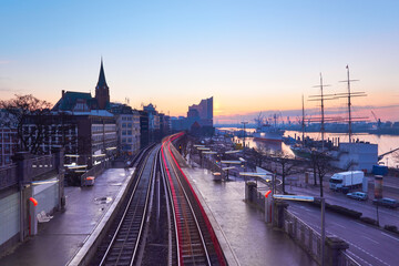 Landungsbrucken station in Hamburg, Germany on a sunrise, early in the morning, with tracer of rear...