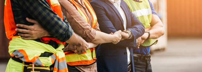 Teamwork engineer technician and foreman shaking hands work successful, connection partnership successful concept.