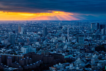 Amazing light rays and sunset in downtown Tokyo Skyline view
