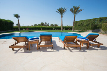 Swimming pool at a luxury tropical holiday villa resort