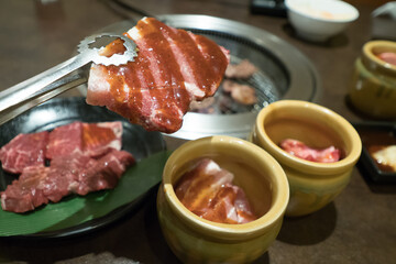 A delicious looking steak cooking on the grill